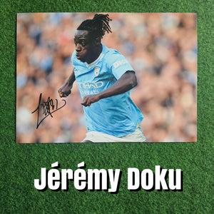 Jérémy Doku Signed Manchester City Photos