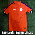 Bernardo Silva, Phil Foden & Gabriel Jesus Multi-Signed 2018/19 Manchester City Training Shirt - Signed Front