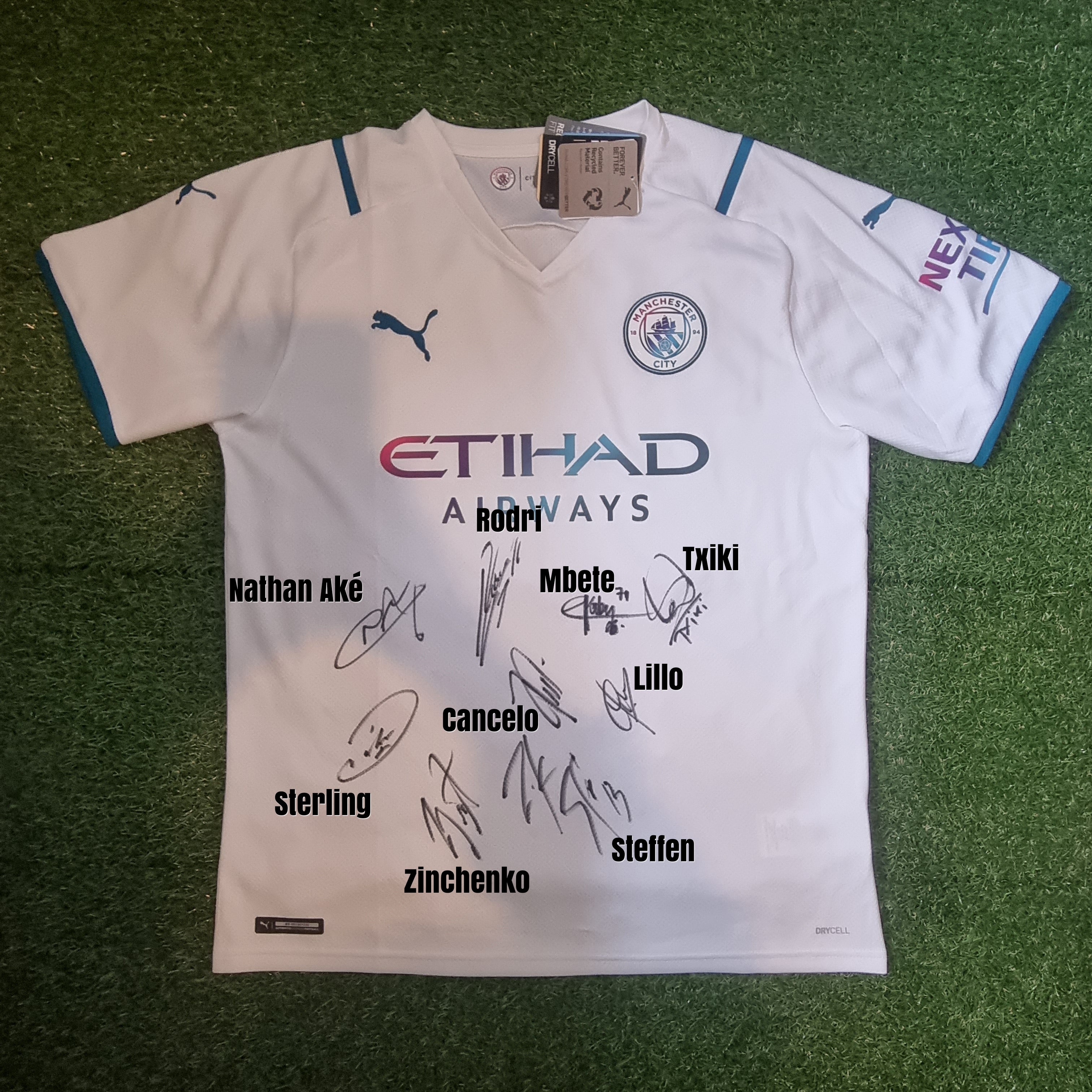Manchester City 2021/22 Away Shirt Multi-Signed by Aké, Rodri, Cancelo & More - Signed Front